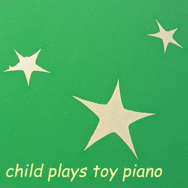 Child Playing With Toy Piano - 1